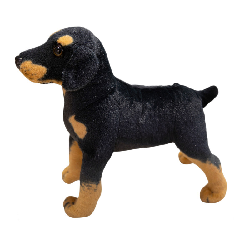 Side view of a realistic Rottweiler plush toy with detailed black and tan coloring