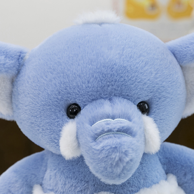 Close-up of the Blue Elephant Plush Toy showcasing soft plush texture, embroidered features, and charming character details