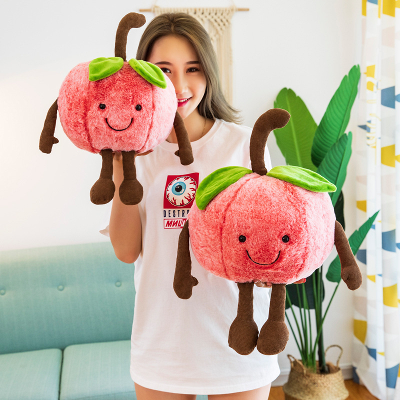 Smiling cherry plush toys with soft plush texture, embroidered facial details, and dangling limbs, showcasing the cute fruit-inspired design and available size options