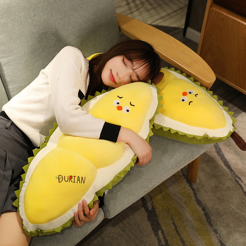 Durian Chick Plush Pillows used for resting and cuddling on a sofa, featuring a soft plush texture and cozy comfort