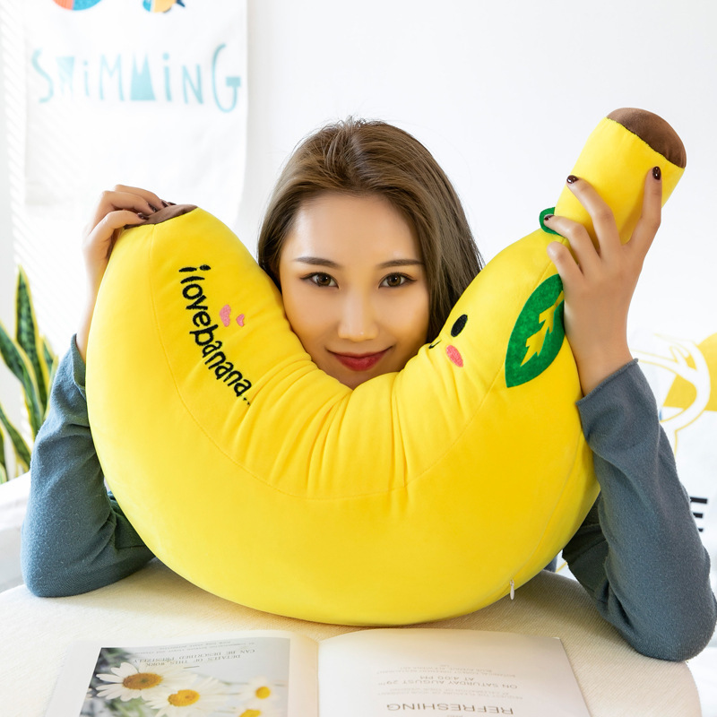 Curved Banana Plush Pillow showcasing its soft plush fabric and cozy hugging design