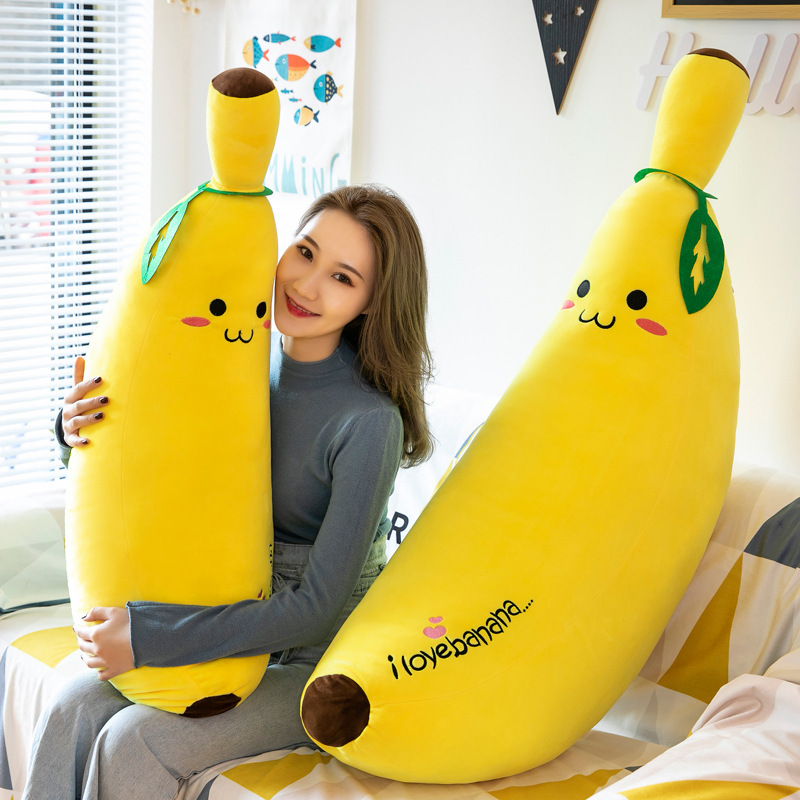 Banana Plush Pillow displayed in a cozy living space, highlighting its long shape and cuddly comfort
