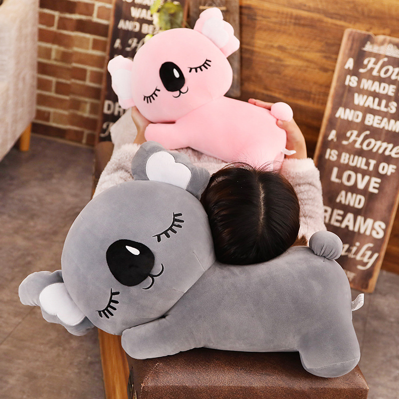 Gray and Pink Koala Plush Pillows in a cozy relaxation setting, showcasing their soft texture and comforting companion feel