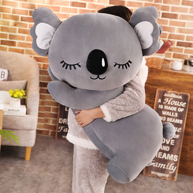 Gray Koala Plush Pillow with a cuddly design, showcasing its soft texture and comforting companion feel