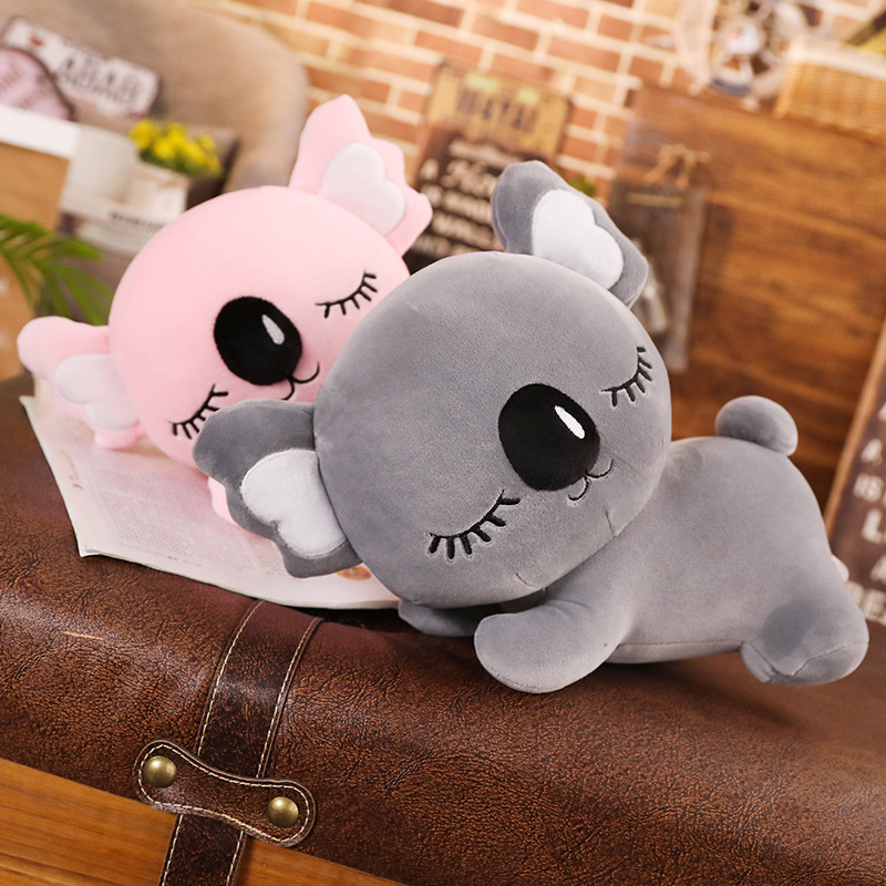 Koala Plush Pillow in gray and pink, featuring a sleeping koala design and soft plush texture