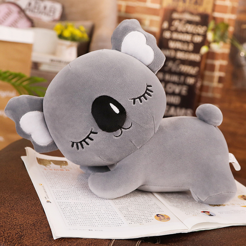 Gray Koala Plush Pillow with a sleeping koala design and soft plush texture
