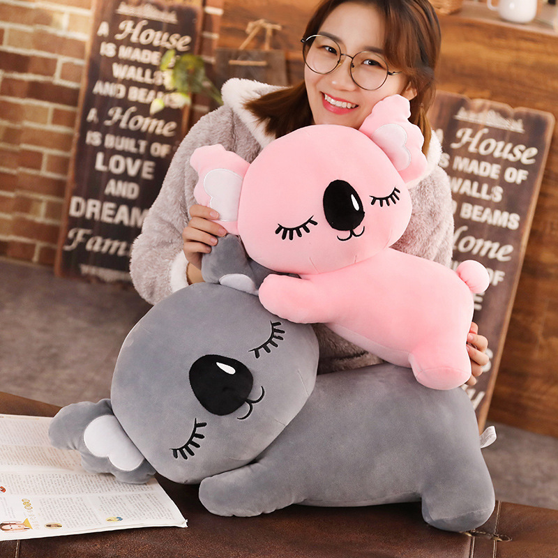 Koala Plush Pillow showcasing its cuddly shape and soft plush fabric for comfort and relaxation