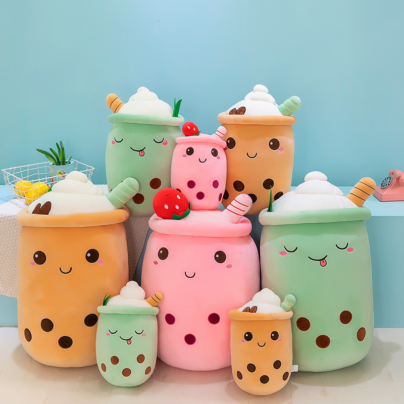 Ice cream bubble tea plush pillows in assorted colors and sizes, featuring cute embroidered faces and dessert-inspired details for cozy room decor