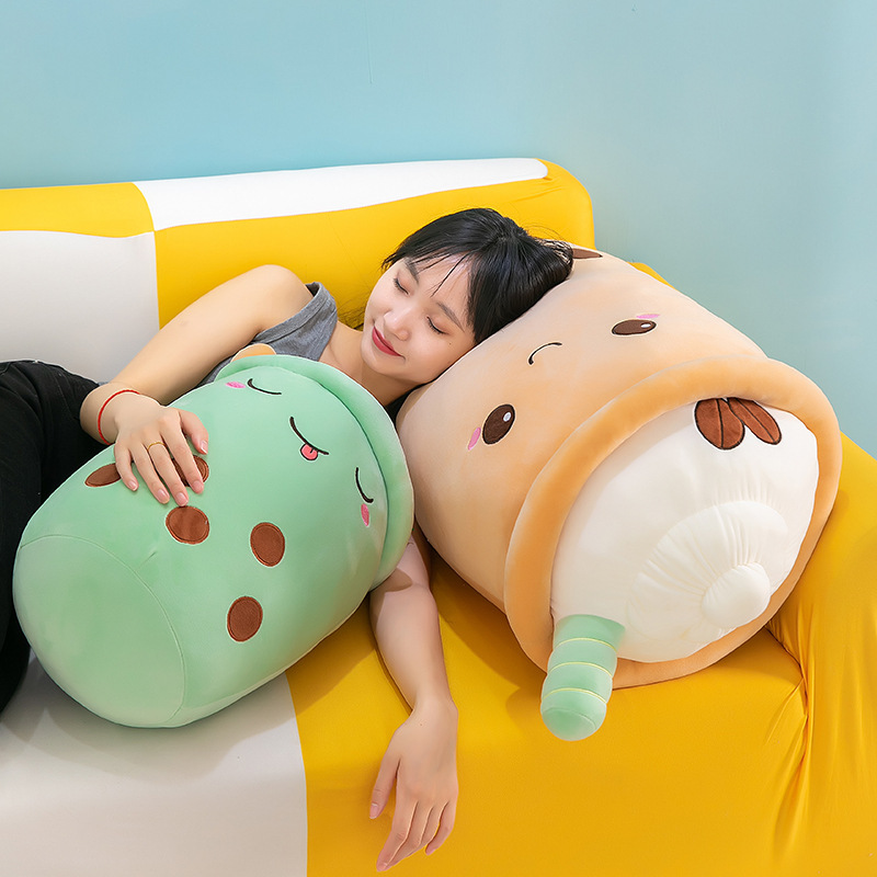 Ice cream bubble tea plush pillows used for lounging and relaxation, featuring soft plush fabric and cozy support for resting on sofas