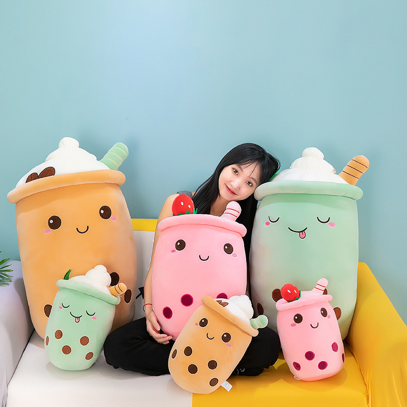 Ice cream bubble tea plush pillow shown in multiple size options, featuring a cute milk tea design with embroidered boba pearls and dessert-inspired details
