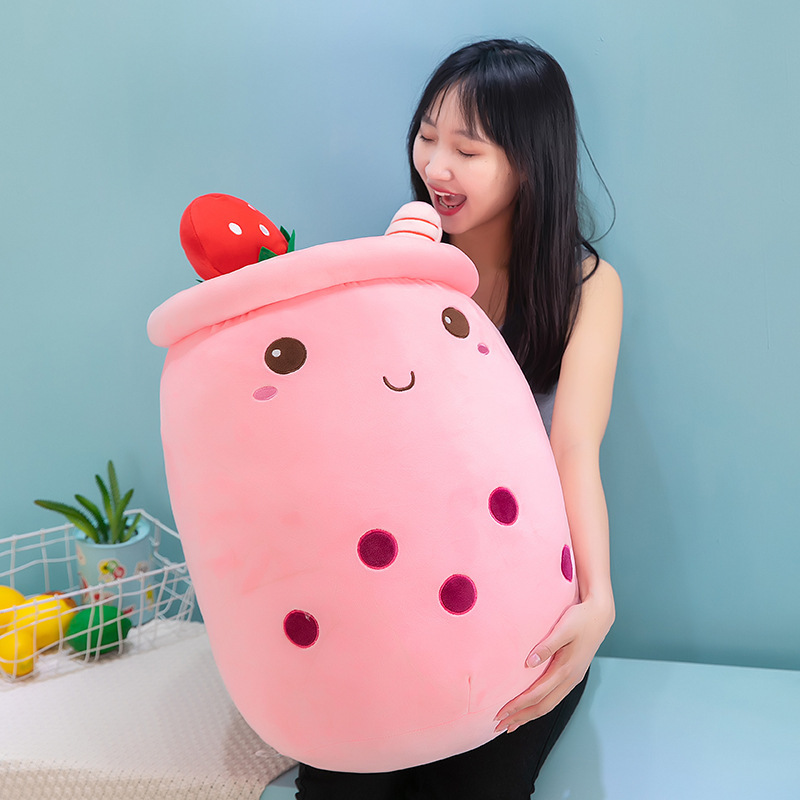 Pink ice cream bubble tea plush pillow with embroidered boba pearls, strawberry-inspired accents, and a soft cuddly design for hugging and relaxation