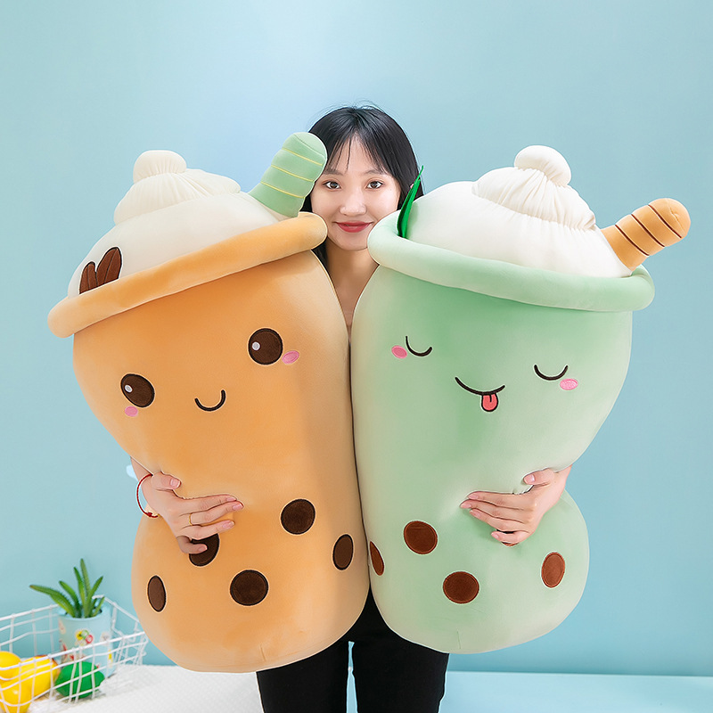 Green and brown ice cream bubble tea plush pillows with soft plush fabric, embroidered boba pearls, and rounded cup-shaped designs