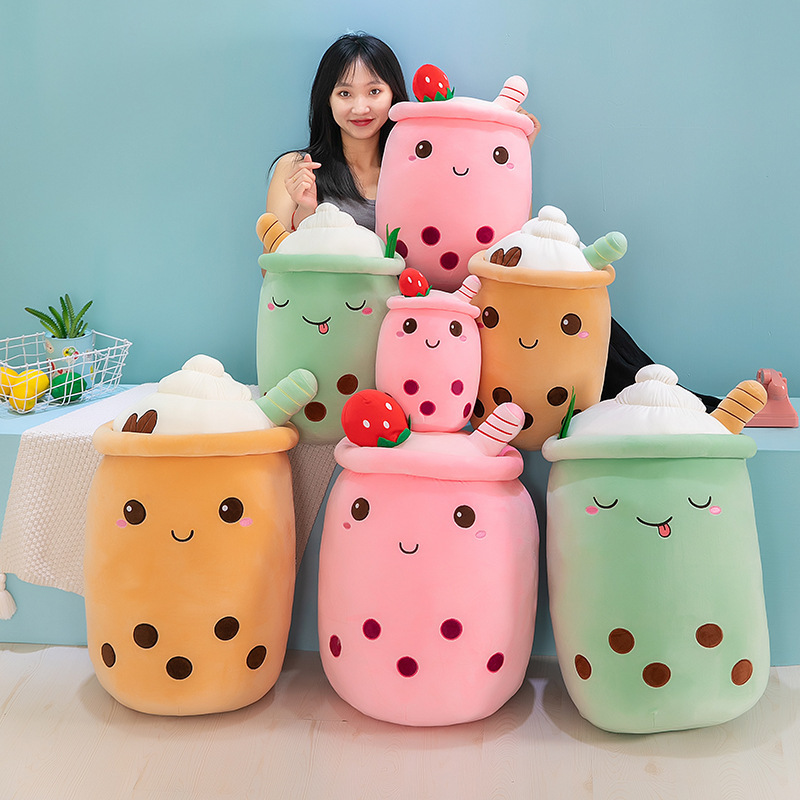 Ice cream bubble tea plush pillows in multiple colors and sizes, featuring cute embroidered faces, boba pearl details, and soft cuddly designs for cozy room decor