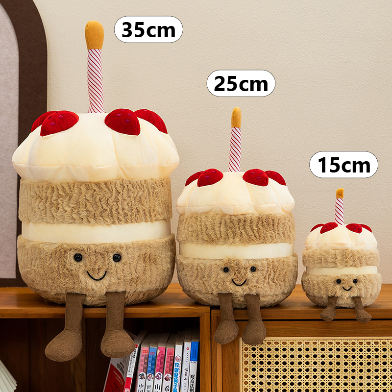 Birthday Cake Plush Toy available in 15 cm, 25 cm, and 35 cm sizes, featuring a smiling cake design, soft plush texture, and dangling legs