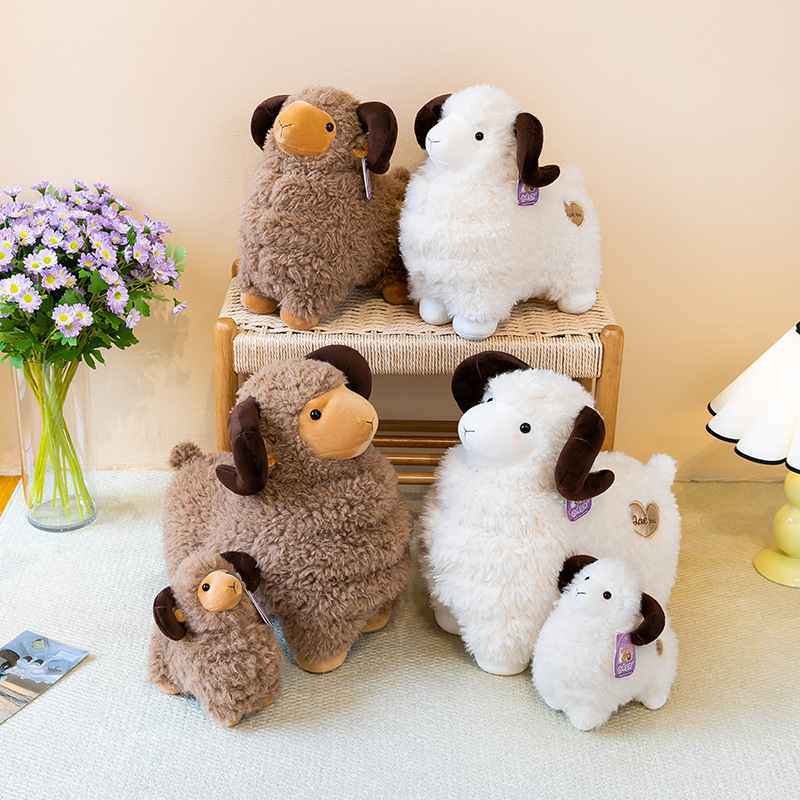Bighorn Sheep Plush Toys in brown and white colors arranged in a warm living room setting
