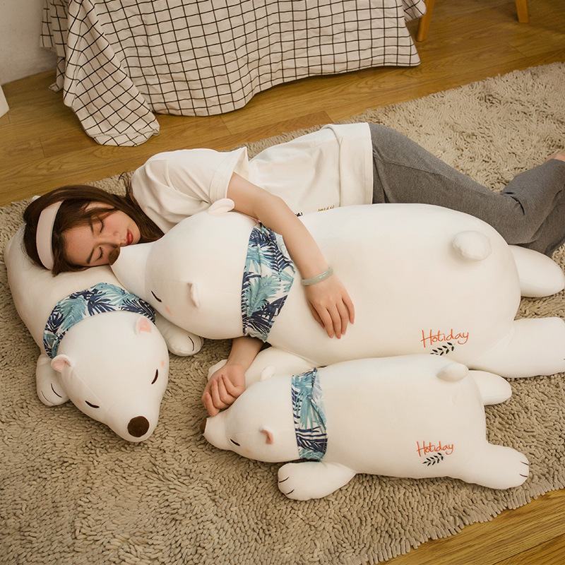 Polar Bear Plush Pillows in multiple sizes arranged on a soft rug, showcasing cozy cuddling, resting, and relaxation at home