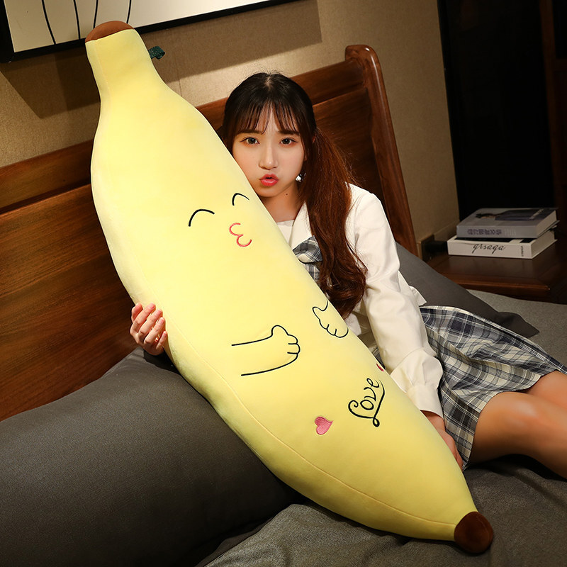Cute Banana Plush Pillow in Kissing style displayed on a bed, featuring a long banana-shaped design, soft plush fabric, and cozy body pillow comfort