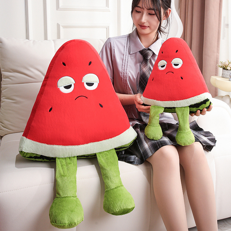 Funny Watermelon Plush Pillow with dangling legs in two sizes, featuring a humorous expression and soft plush texture, ideal for sofas, bedrooms, and playful home decor