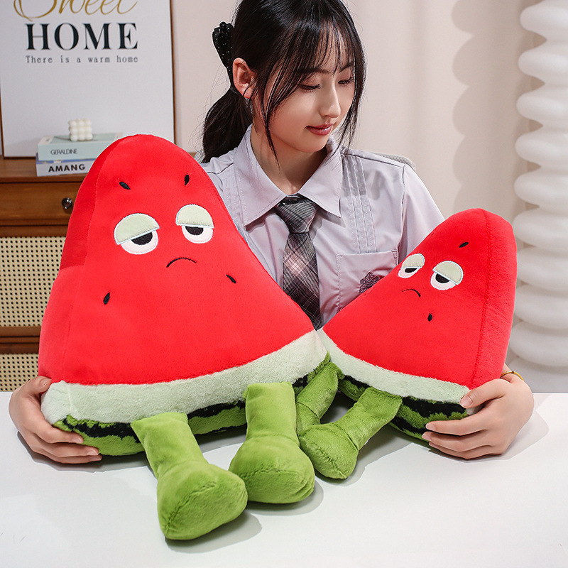 Funny Watermelon Plush Pillows in two sizes featuring sleepy-eyed expressions, soft plush fabric, and dangling legs, perfect for playful home decor and cozy relaxation