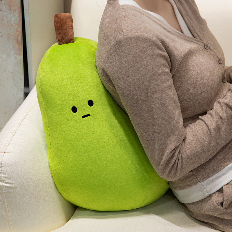 Pear Fruit Plush Toy used as a soft back cushion on a sofa, providing comfort while sitting and relaxing