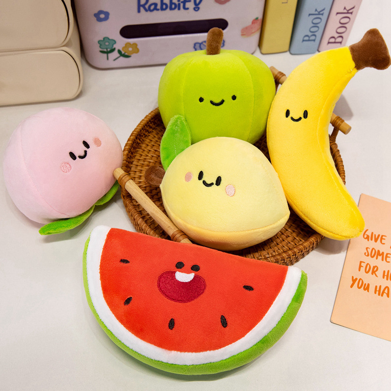 Smiling Fruit Plush Toys featuring soft plush fabric, cheerful embroidered faces, and colorful fruit-inspired designs arranged in a decorative basket
