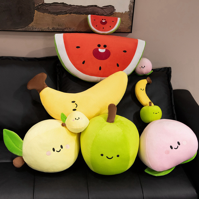 Smiling Fruit Plush Toys featuring Banana, Watermelon, Peach, Lemon, and Green Apple designs displayed together on a sofa in a cozy room setting