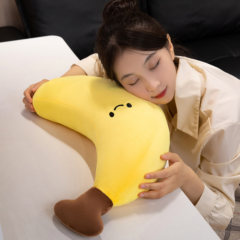 Banana Plush Toy used as a soft cushion for relaxing, featuring plush fabric and a cute banana-inspired design