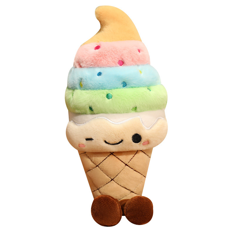 Rainbow Ice Cream Plush Toy with rainbow soft serve design, waffle cone base, embroidered winking face, and dangling legs on a plain background