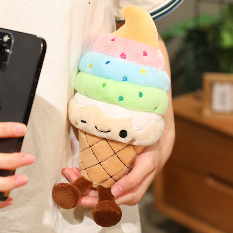Rainbow Ice Cream Plush Toy with soft plush fabric, rainbow-colored layers, and playful dangling legs, highlighting its cute and cozy design