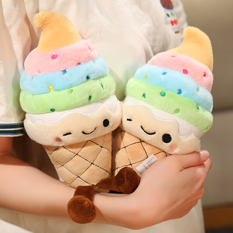 Pair of Rainbow Ice Cream Plush Toys featuring embroidered winking faces, colorful soft serve layers, and dangling legs for collecting or gifting