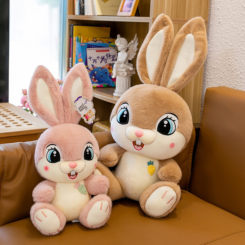 Sweet Bunny plush toys in Pink and Brown, showcasing available color options with soft fur, oversized ears, and a cozy decorative look for sofas and bedrooms