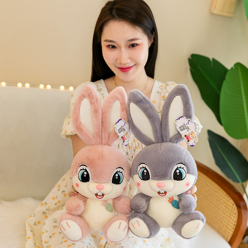 Sweet Bunny plush toys in pink and gray displayed side by side, highlighting soft plush fabric, oversized ears, and cuddly size for hugging and room decor