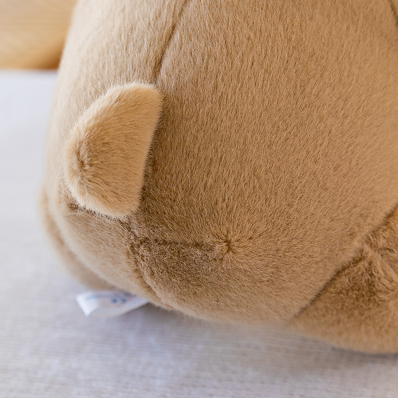 Close-up of the Sweet Bunny Plush Toy tail, showcasing the soft plush fabric, fluffy texture, and carefully stitched details