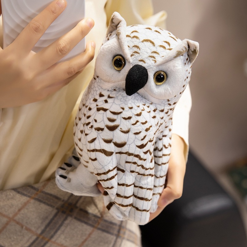 White owl plush toy with realistic feather detailing, expressive eyes, and soft plush fabric, designed for cuddling, displaying, or adding woodland charm to cozy spaces