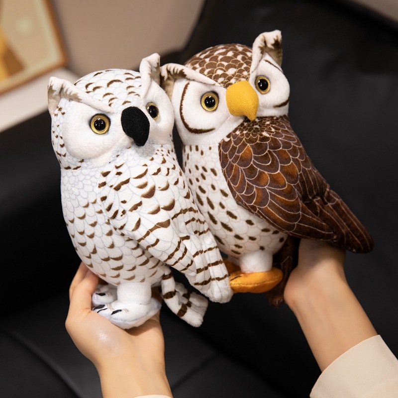 Brown and white owl plush toys with realistic feather patterns and expressive eyes, showcasing a compact size that fits comfortably in the hands for cuddling and display