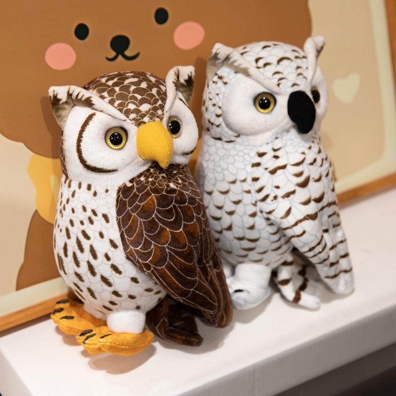 Brown and white owl plush toys displayed on a shelf, featuring realistic feather patterns and expressive eyes, adding a cozy woodland touch to home decor
