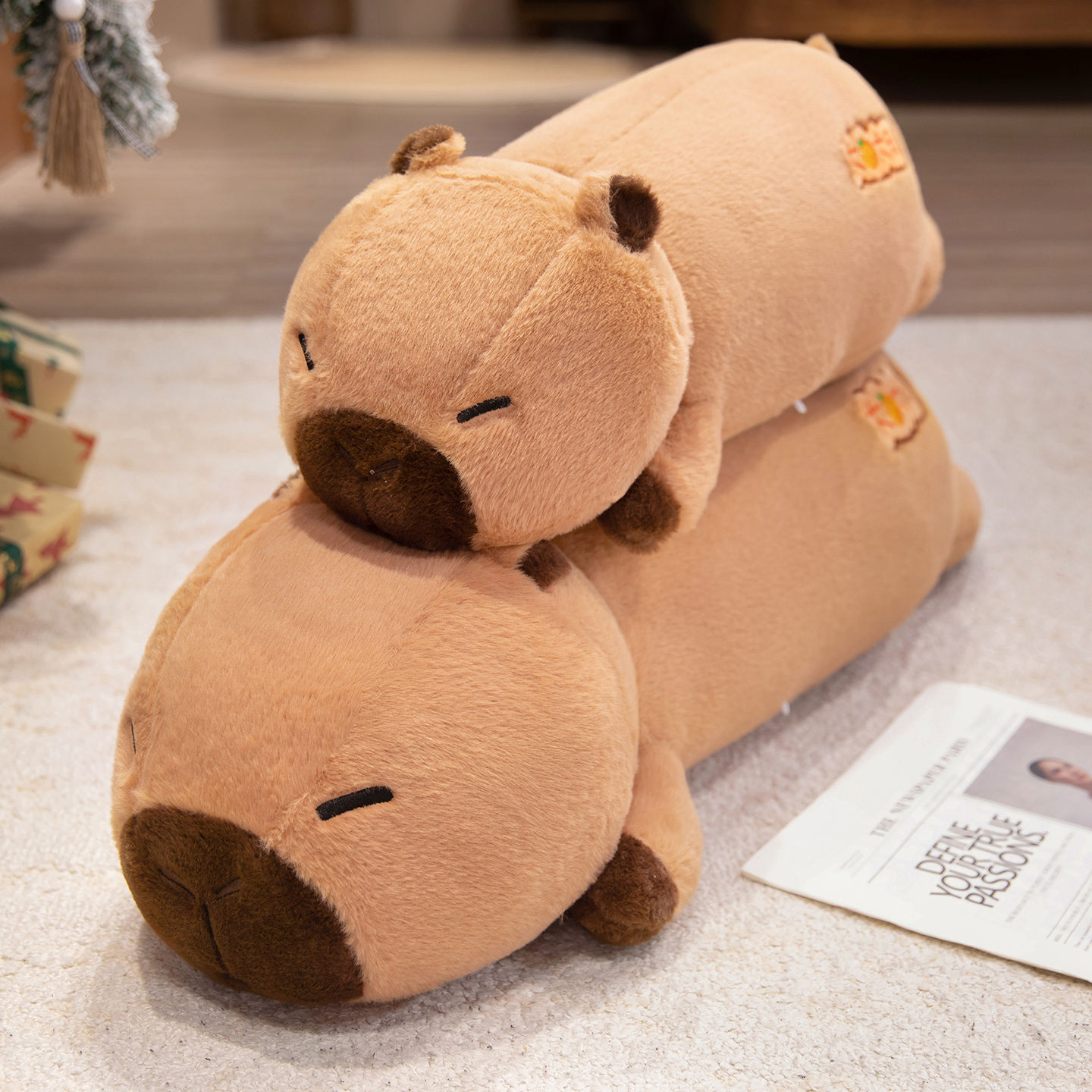 Lucky Capybara plush body pillows in two sizes, featuring soft plush fabric, embroidered lucky details, and a cuddly design for comfort and relaxation