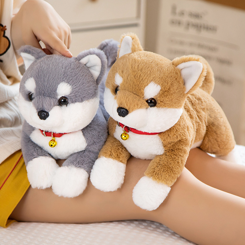 Brown and gray Shiba Inu plush toys featuring fluffy plush fabric and charming bell collar details