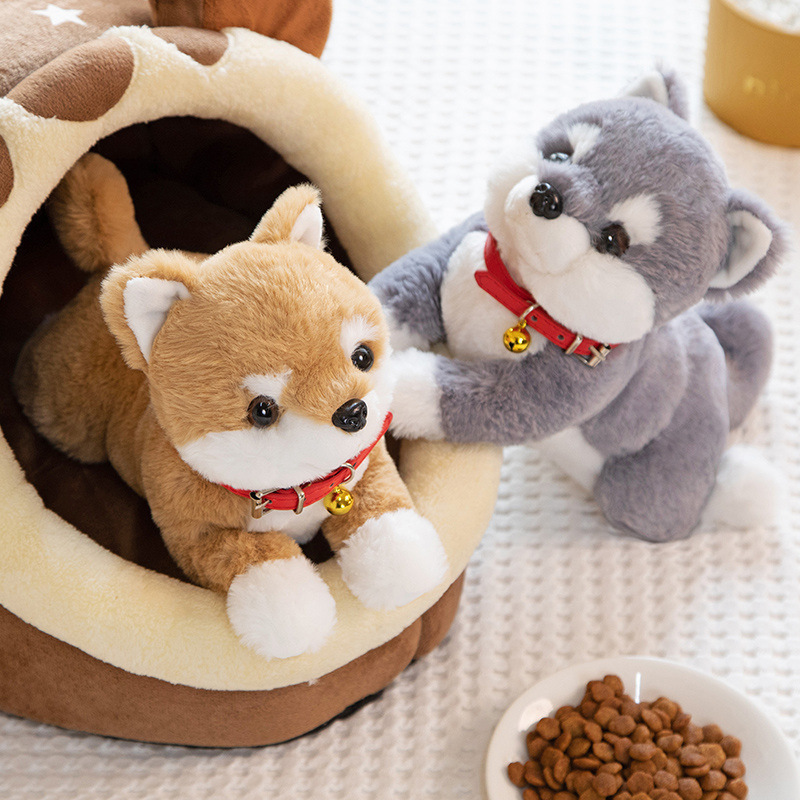 Shiba Inu plush toys arranged beside a pet bed, highlighting soft textures and lifelike puppy-inspired details
