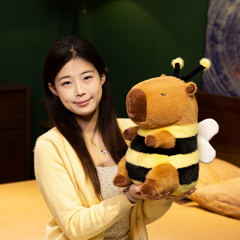 Bee Capybara Plush Toy with fuzzy antennae, soft wings, and black-and-yellow stripes, showcasing its decorative appeal and cuddly proportions