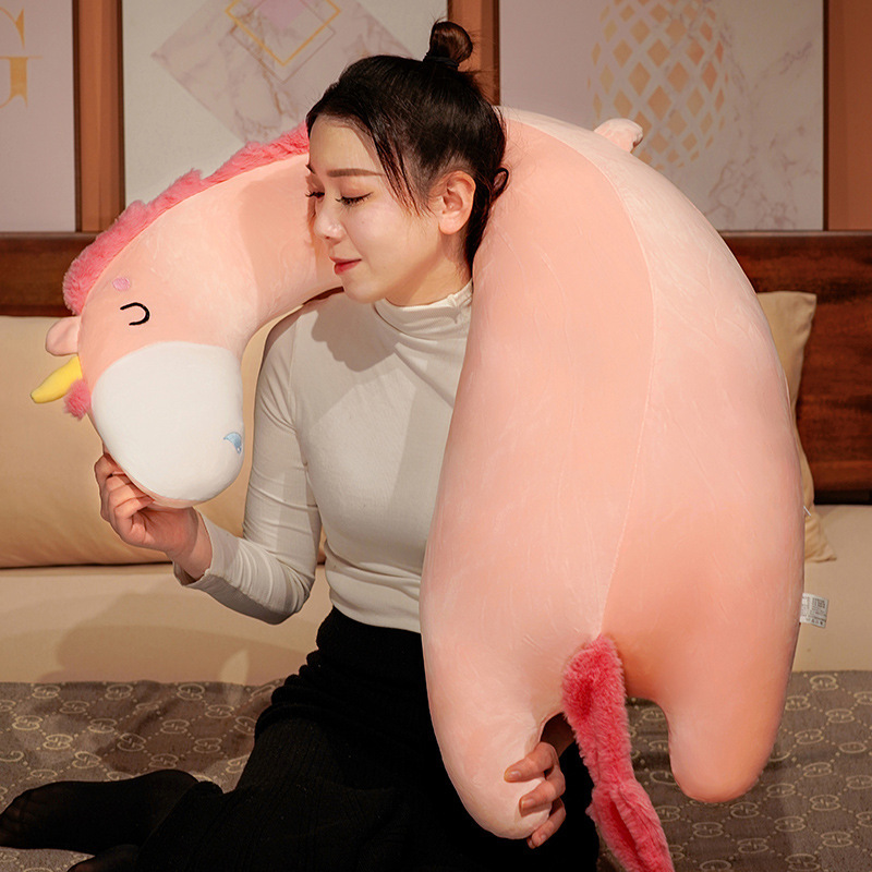 Unicorn Long Plush Pillow wrapped around the body for cozy cuddling and relaxing on a bed