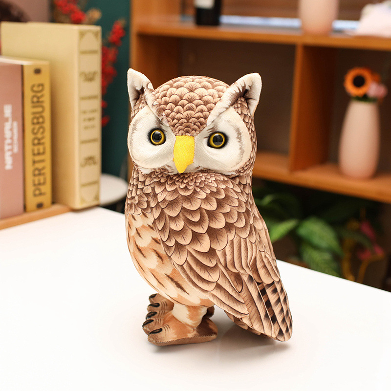 Cute Owl Plush Toy displayed on a desk, featuring realistic feather-inspired details and a charming standing owl design for home decor
