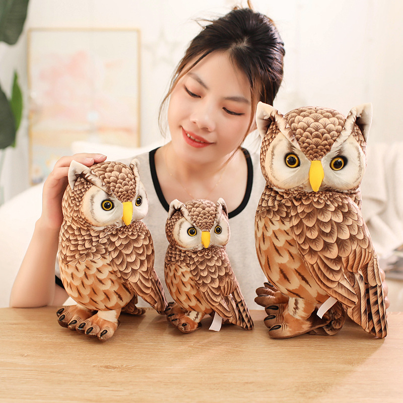 Cute Owl Plush Toy shown in multiple sizes with detailed feather-inspired printing, bright eyes, and a standing owl design for display, collecting, and gifting