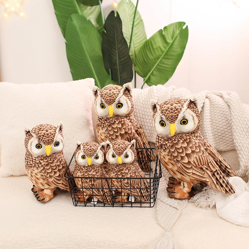 Cute Owl Plush Toy displayed in multiple sizes, featuring detailed feather-inspired printing, bright eyes, and a standing owl design for display and collecting
