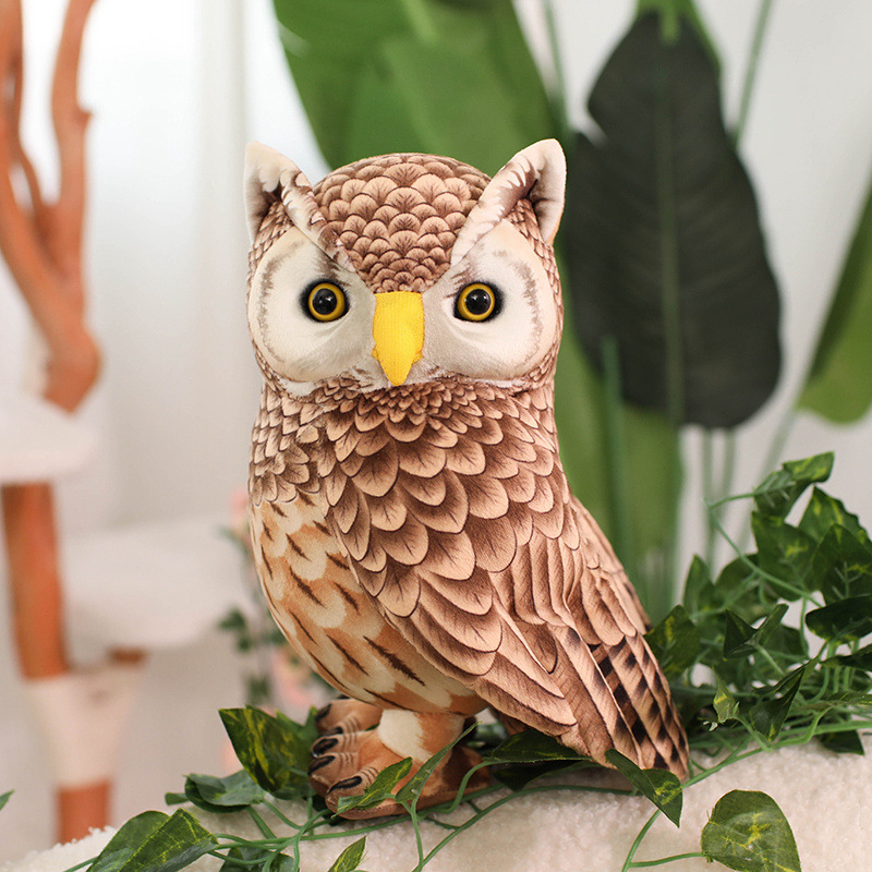 Cute Owl Plush Toy displayed among greenery, featuring detailed feather-inspired printing and woodland-inspired decorative charm
