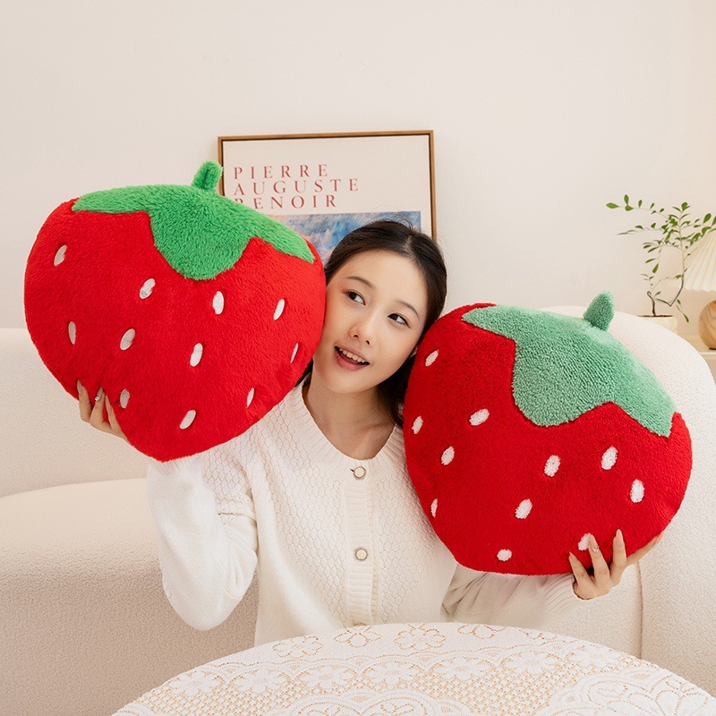 Strawberry plush pillows featuring a fluffy fruit-inspired design, soft texture, and cozy appeal for hugging and lounging