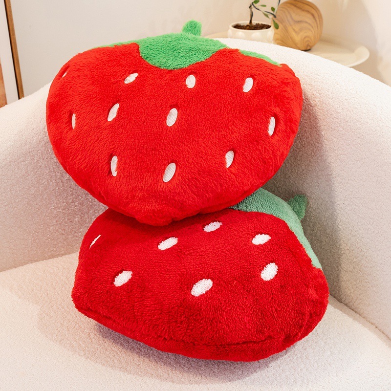 Strawberry plush pillow with soft faux rabbit fur texture, featuring a fluffy fruit-inspired design and embroidered seed details