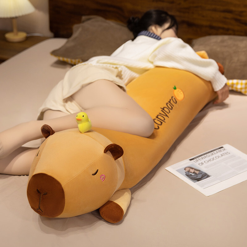 Cute Capybara Long Plush Pillow in plush fabric with a sleepy capybara design, ideal for hugging, lounging, and resting in bed