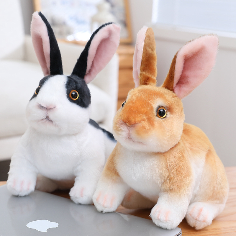 Black White and Brown Realistic Rabbit Plush Toys in crouching style with realistic fur patterns and expressive eyes