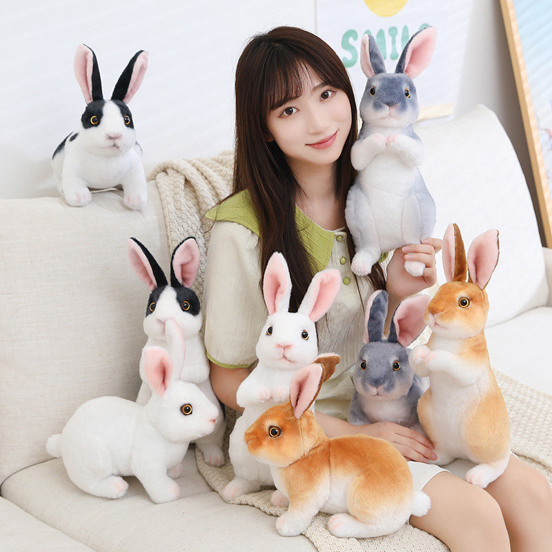 Realistic Rabbit Plush Toy featuring sitting and crouching bunny designs in White, Black White, Brown, and Gray colors for display and decor